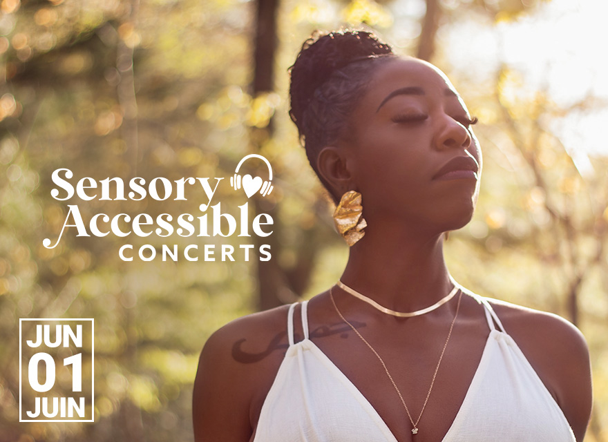 A woman with braided hair pulled up, wearing gold leaf-shaped earrings and layered gold necklaces, stands peacefully outdoors with her eyes closed, bathed in warm sunlight. She wears a white sleeveless top. The words "Sensory Accessible Concerts" appear to the left with a headphone and heart icon. Below are red, orange, green, and grey chair icons, and the date “JUN 01 JUIN” is displayed in a white box. The overall tone is calm and reflective.