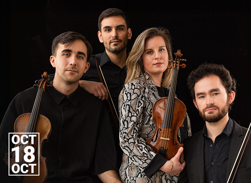Four members of Quatuor Cobalt pose together against a black background, holding their string instruments. On the left, a violinist in a dark shirt rests his arm on his violin. Behind him, another violinist in black stands slightly back. At the center, a violist wearing a patterned snakeskin-style jacket holds her instrument upright. On the right, the cellist in a black shirt and jacket holds his bow. All look directly at the camera with calm, confident expressions. A concert date graphic reads “OCT 18” in white text with small red and gray chair icons above it.