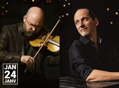 A promotional image features two classical musicians. On the left, a bald man with glasses and a beard wears a dark leather jacket and plays the violin with a focused expression. On the right, another man with short hair and a receding hairline wears a dark shirt and sits at a piano, gazing thoughtfully to the side. Both are set against a dark background with soft, out-of-focus lights. In the bottom left corner, white text reads "JAN 24 JANV."
