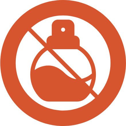 A circular orange sign with a white background showing a crossed-out perfume bottle, indicating a scent-free or no-fragrance policy.