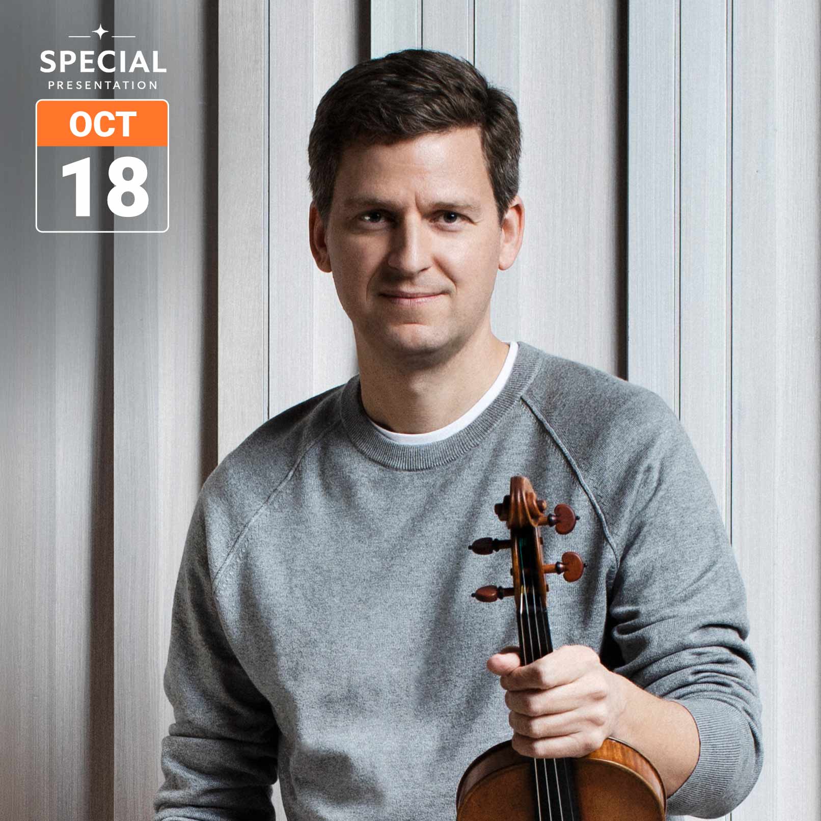 Portrait of a man in a grey sweater holding a violin against a vertical wood-panelled background. A Special Presentation graphic in the upper left displays the date October 18.